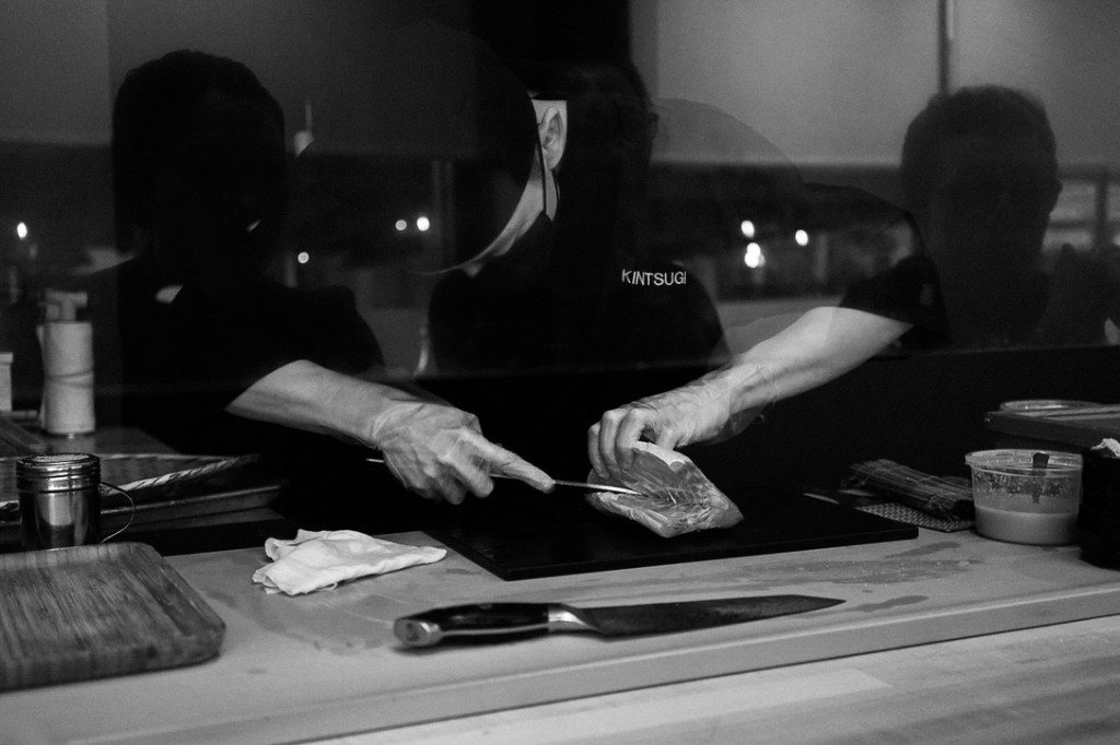 Chef at Kintsugi cutting fish