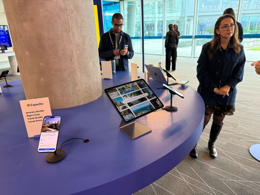 AI Agent demo stations on phone and tablet at EXPLORE ’25