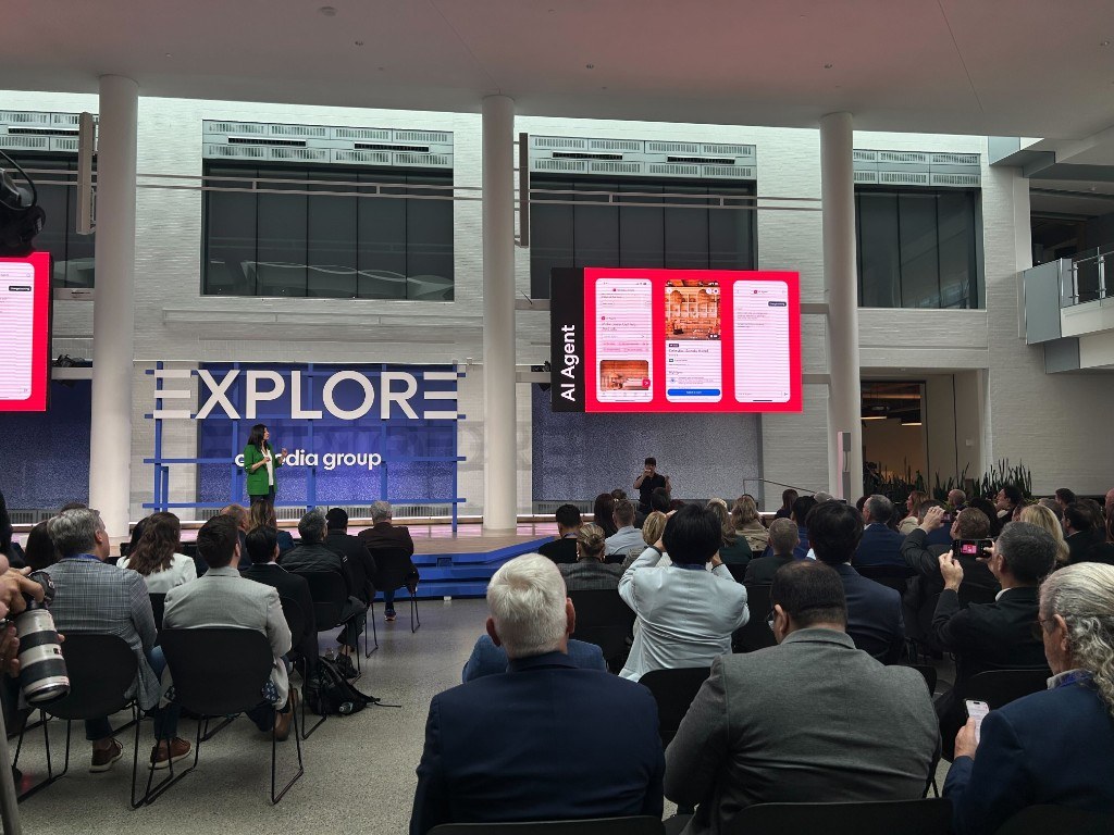 Expedia Group CPO presenting the AI Agent on stage at EXPLORE ’25
