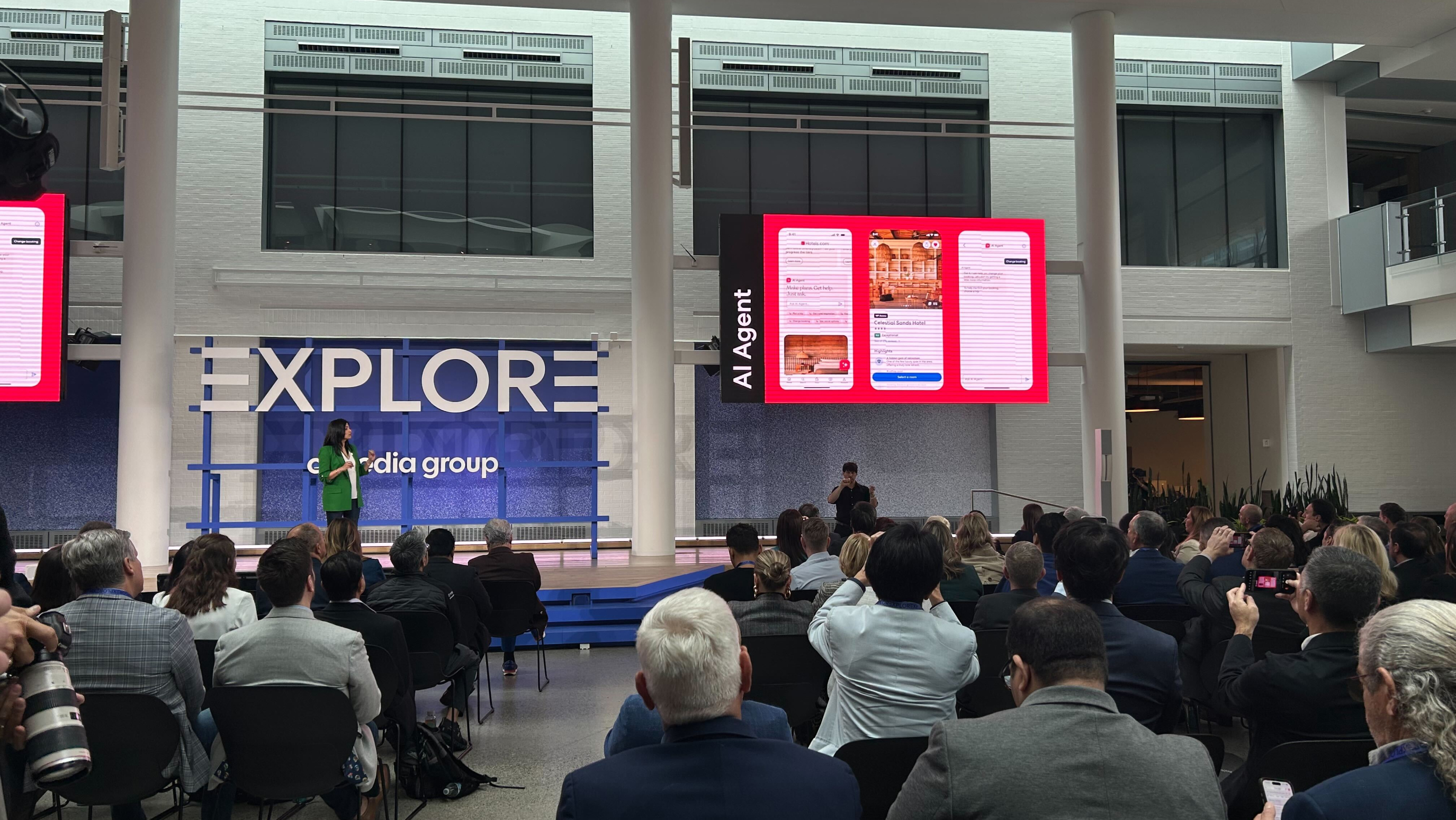EXPLORE ’25 keynote, with the AI Agent on the main screen