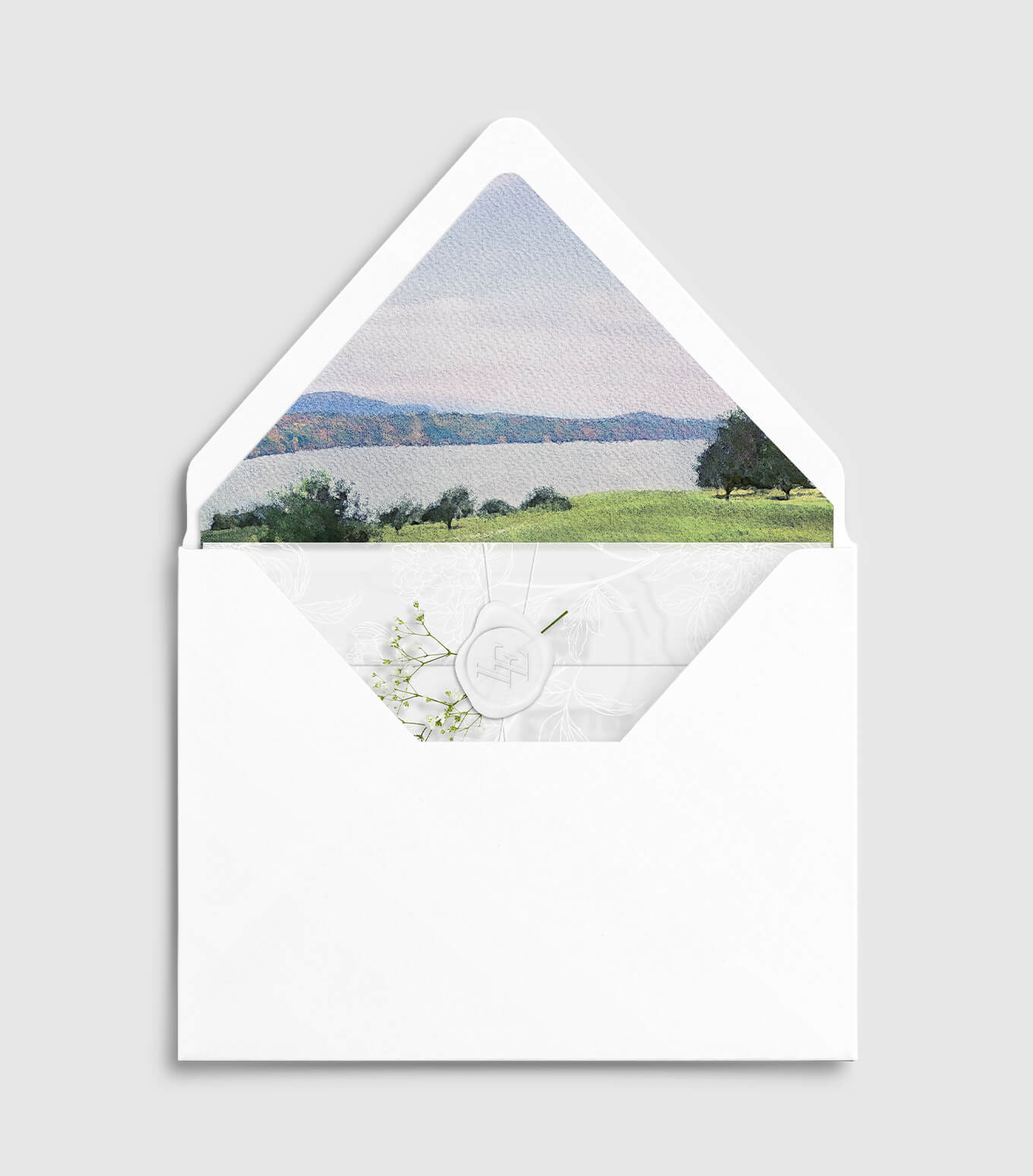 Invitation package opened to reveal the suite